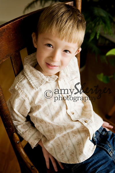 Posing in a chair for Bozeman preschool photos