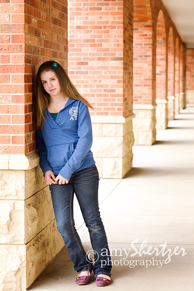 High school portrait under the arches at the Bozeman Public Library