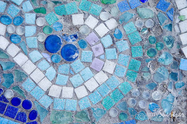 Blue mosaic tiles make a Bozeman sidewalk pretty