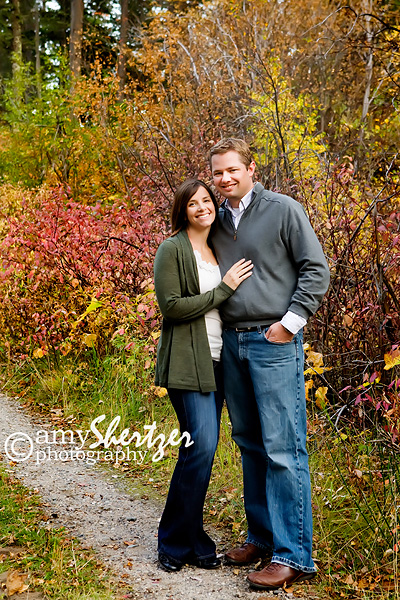 A Bozman husband and wife pose for a portrait amid the glorious fall colors.
