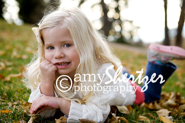 Sweet Bozeman blond 3-year-old poses for a photo