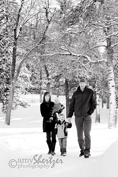 A young Bozeman family poses for a portrait in the snow