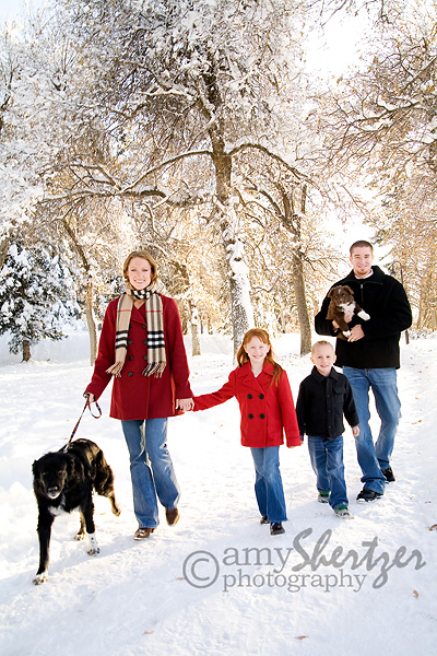 A Bozeman, Montana family walks through a winter wonderland of snow.