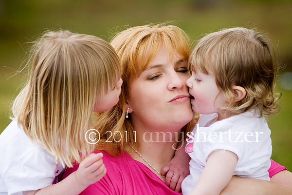 Kisses on the cheeks from her two daughters.