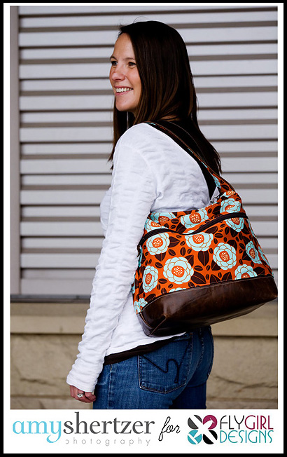 Amy Shertzer Photography photographing Fly Girl brown and orange purse.